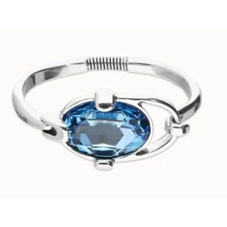 Bangle bracelet with faceted blue crystal