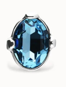 Large ring with blue oval faceted crystal