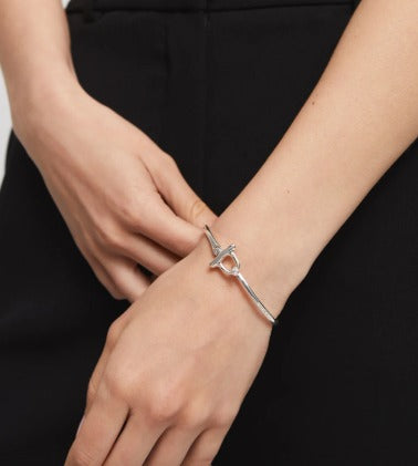 Bangle bracelet with white topaz