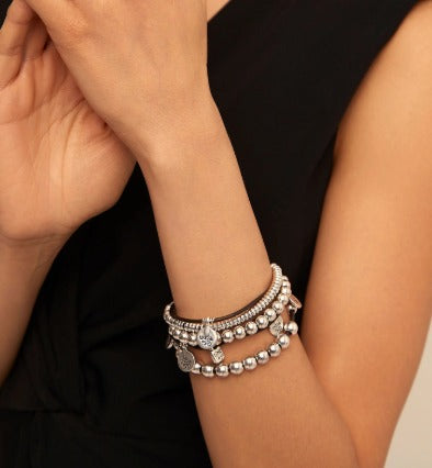 Leather beaded bracelet with charms