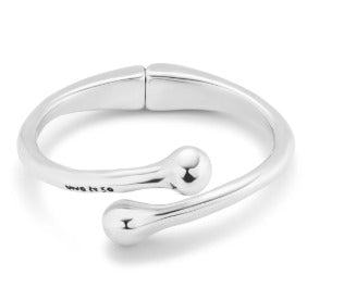 Bangle bracelet with inner spring