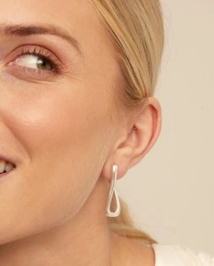 Link shaped hoop earrings