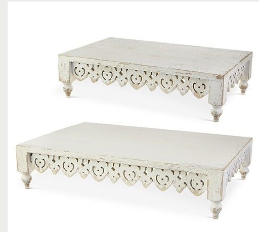 DISTRESSED RISER